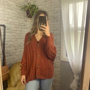 Urban Outfitters // burnt orange button down cardigan sweater